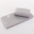 Grey waffle weave cotton hand towel by eprolo for bathroom or face care.