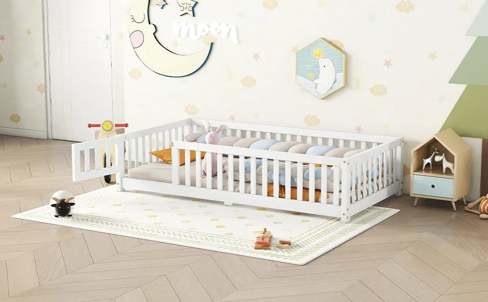 White eprolo twin size kids floor bed with safety guardrails and a side door in a nursery.
