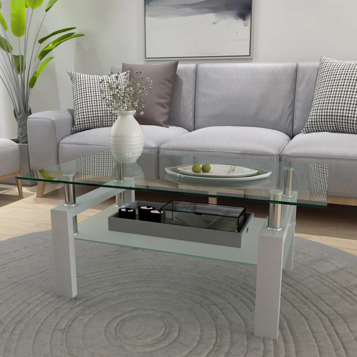 Modern eprolo white coffee table with clear glass top and shelf in a living room setting