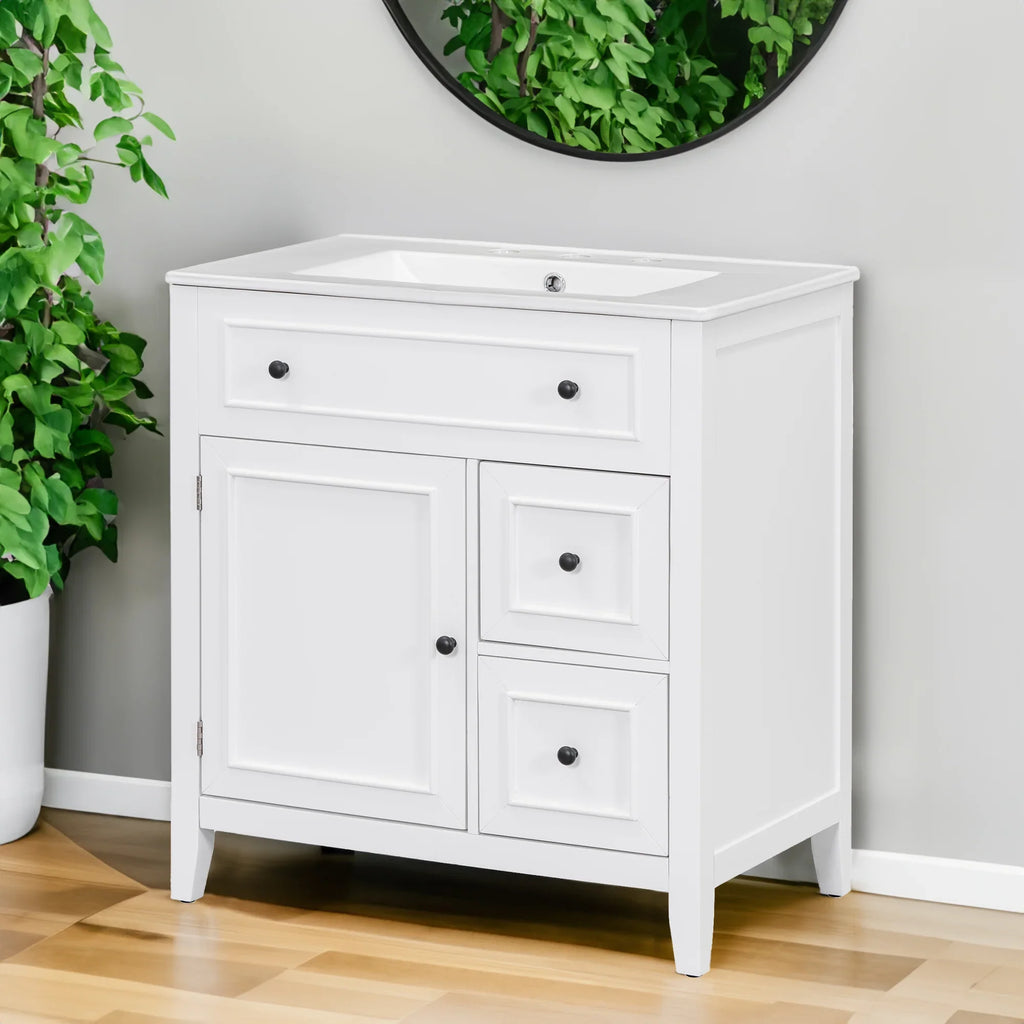 White 30 inch eprolo bathroom vanity with sink top, cabinet door, and two drawers.