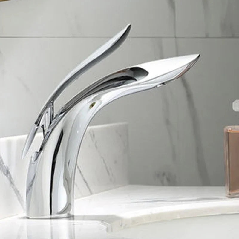 Modern chrome eprolo creative bathroom washbasin faucet with curved design on marble counter