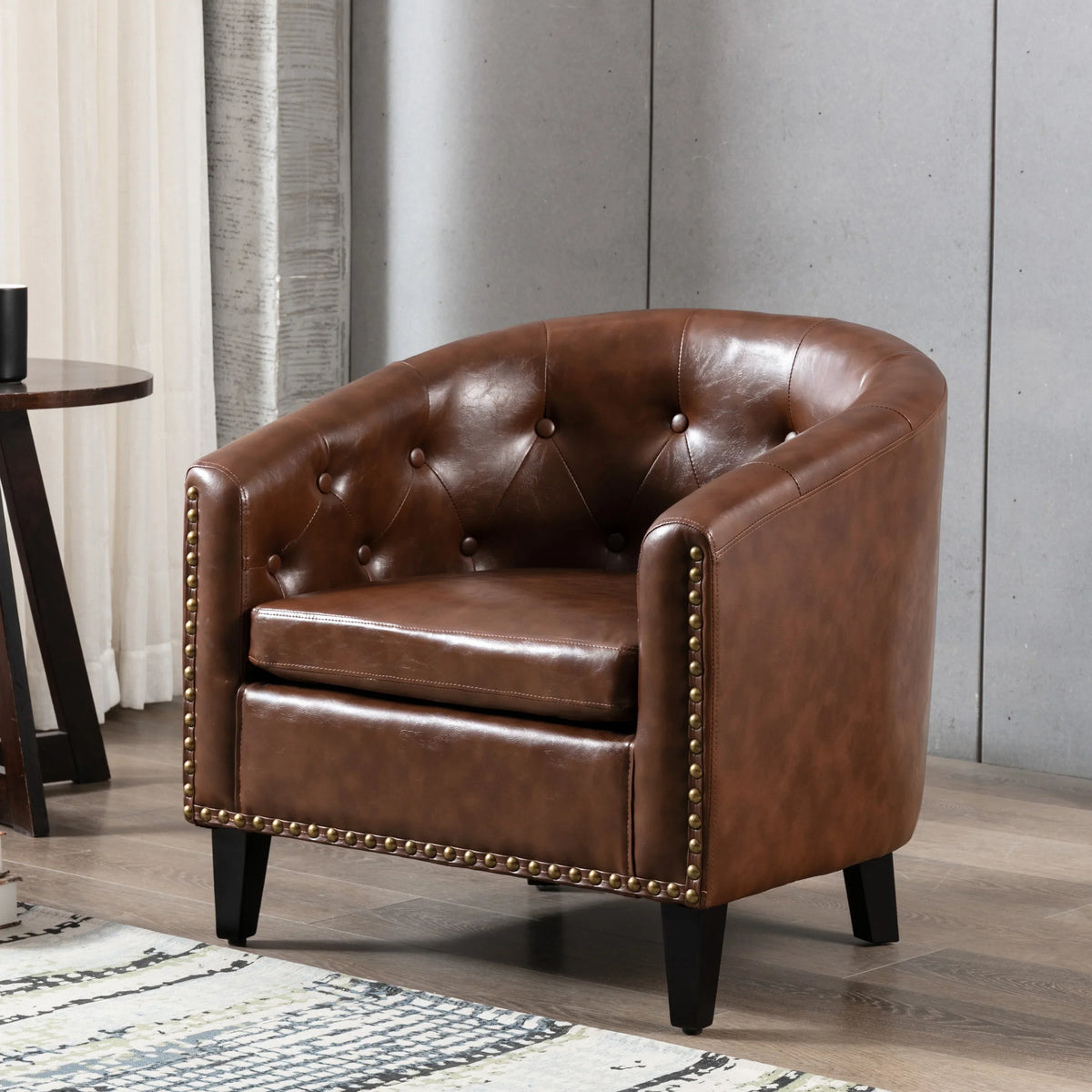 Brown PU leather tufted barrel chair with gold nailhead trim by eprolo