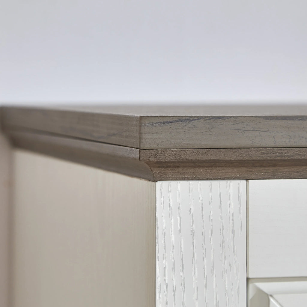 Close-up of the grey wooden top and white finish of an eprolo farmhouse dressing table.