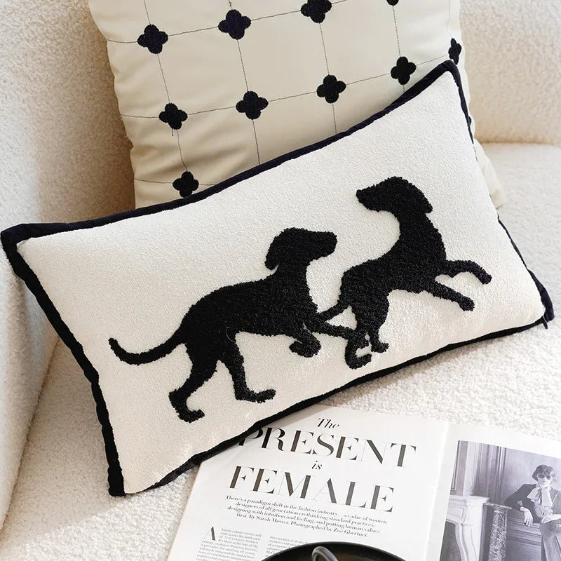 Living room sofa pillow cover with black dog silhouettes on a white cushion by eprolo