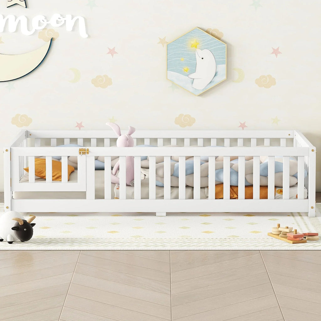 White eprolo twin size floor bed with safety guardrails and door in a nursery.