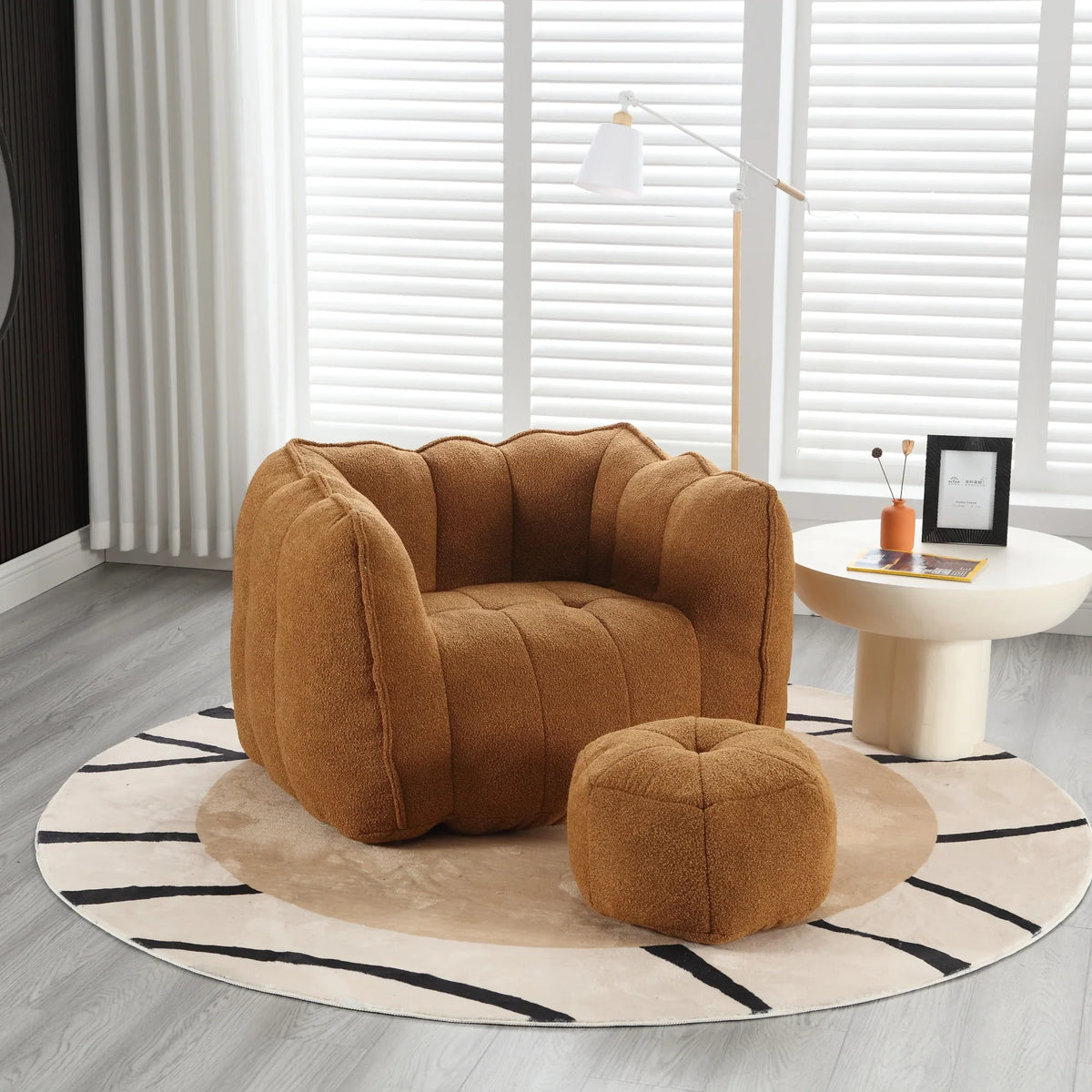 Brown soft square bean bag chair with matching footstool by eprolo on a patterned rug.