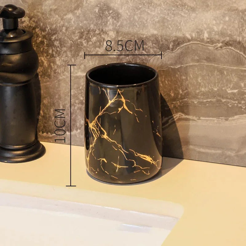 Black marble pattern ceramic bathroom tumbler by eprolo, measuring 10cm height and 8.5cm width.
