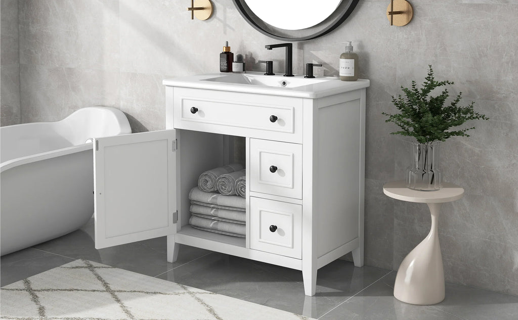 White 30 inch eprolo bathroom vanity with sink top, two drawers, and storage cabinet.