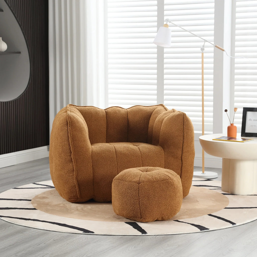 Brown soft square bean bag chair with matching footstool by eprolo on a patterned rug.