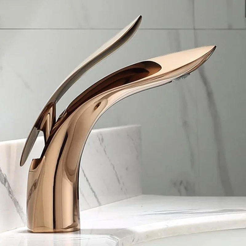 eprolo rose gold creative personalized bathroom washbasin faucet on a marble countertop