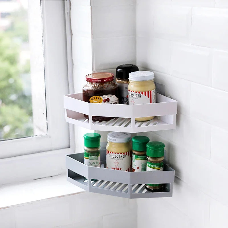 White corner wall hanging storage rack with spice jars in a kitchen setting.