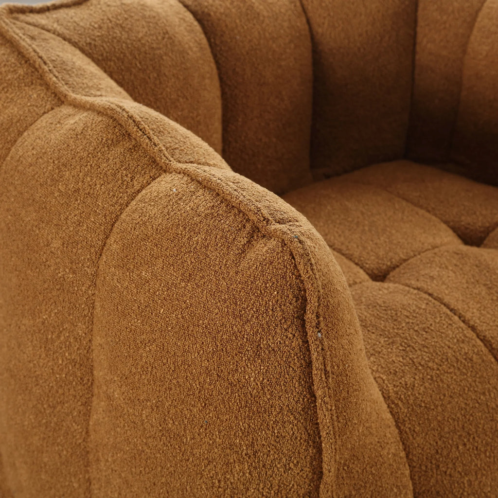 Close-up of the brown textured fabric on an eprolo soft square bean bag chair.