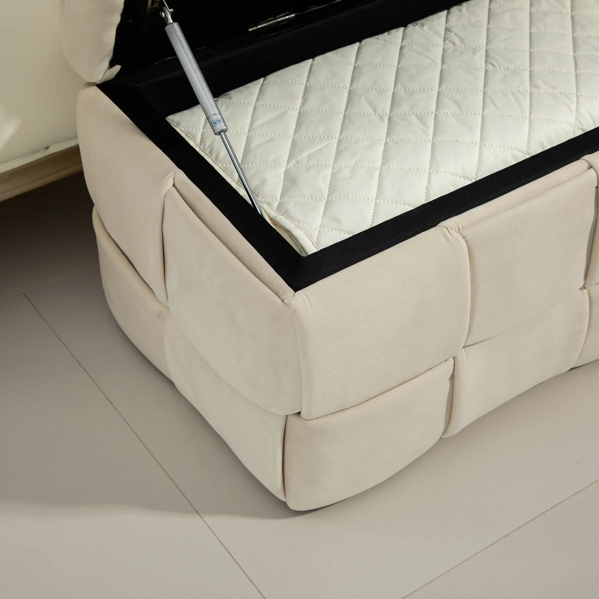 Beige eprolo storage ottoman chair with a white quilted interior and safety hinge mechanism.