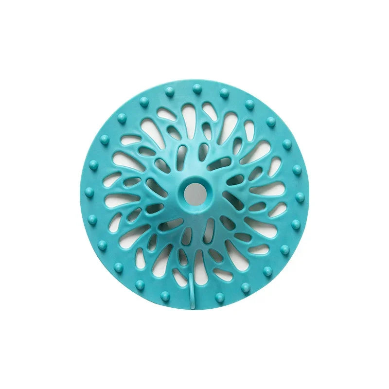 Teal eprolo volcano shape anti-clogging floor drain cover and hair filter for bathroom sink.
