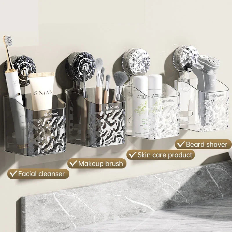 eprolo clear suction bathroom wall shelves holding facial cleanser, makeup brushes, and shaver.