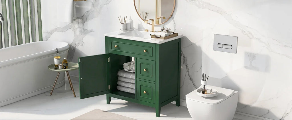 Green eprolo 30 inch bathroom vanity with white sink top and gold hardware in a marble bathroom