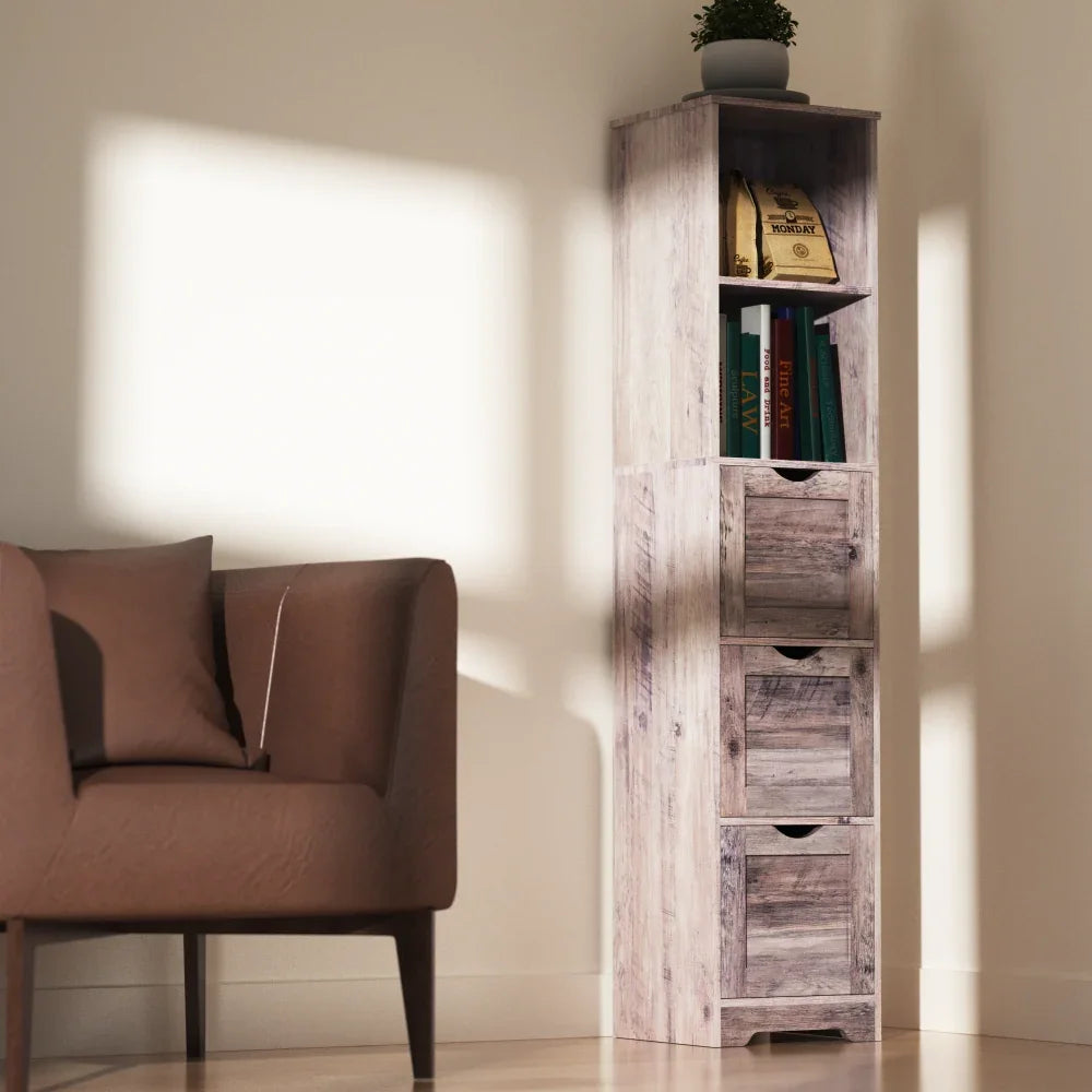 Tall narrow grey storage cabinet with 3 drawers and 2 shelves standing in a room.