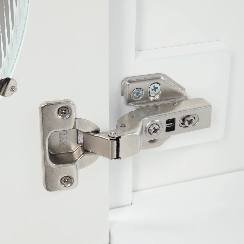 Close-up of a silver metal hinge installed on a white eprolo bathroom vanity cabinet door.