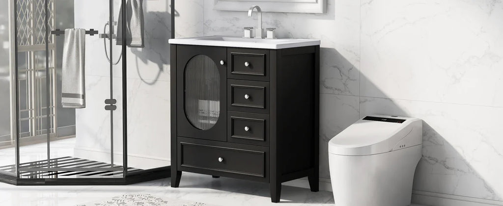 Black 30 inch eprolo bathroom vanity with white sink and three drawers in a modern bathroom.