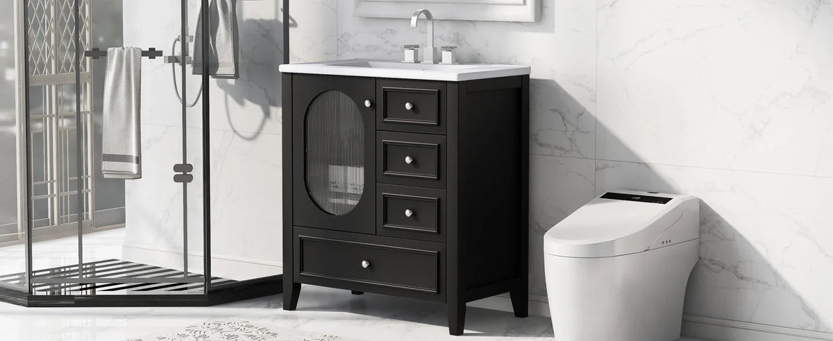 Black 30 inch eprolo bathroom vanity with white sink and three drawers in a modern bathroom.