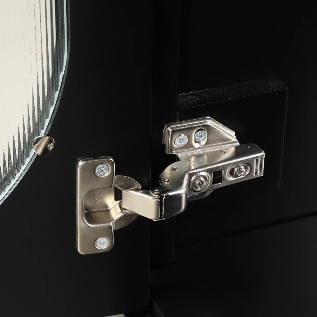 Close-up of a silver metal door hinge on a black eprolo bathroom vanity cabinet.