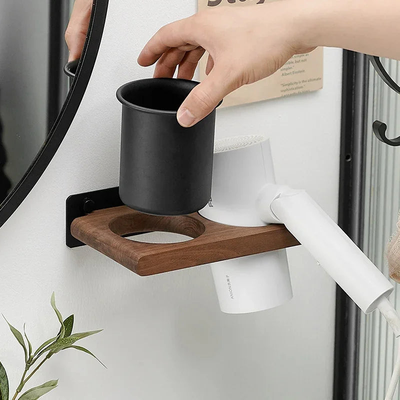 eprolo solid wood hair dryer storage rack mounted on a bathroom wall.