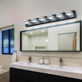 Modern eprolo LED black vanity lights installed over a large bathroom mirror.