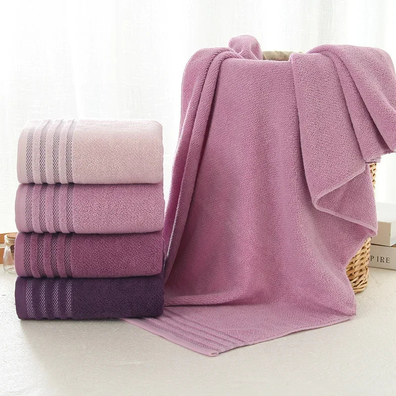 Set of eprolo thick cotton bath towels in shades of purple and lilac.