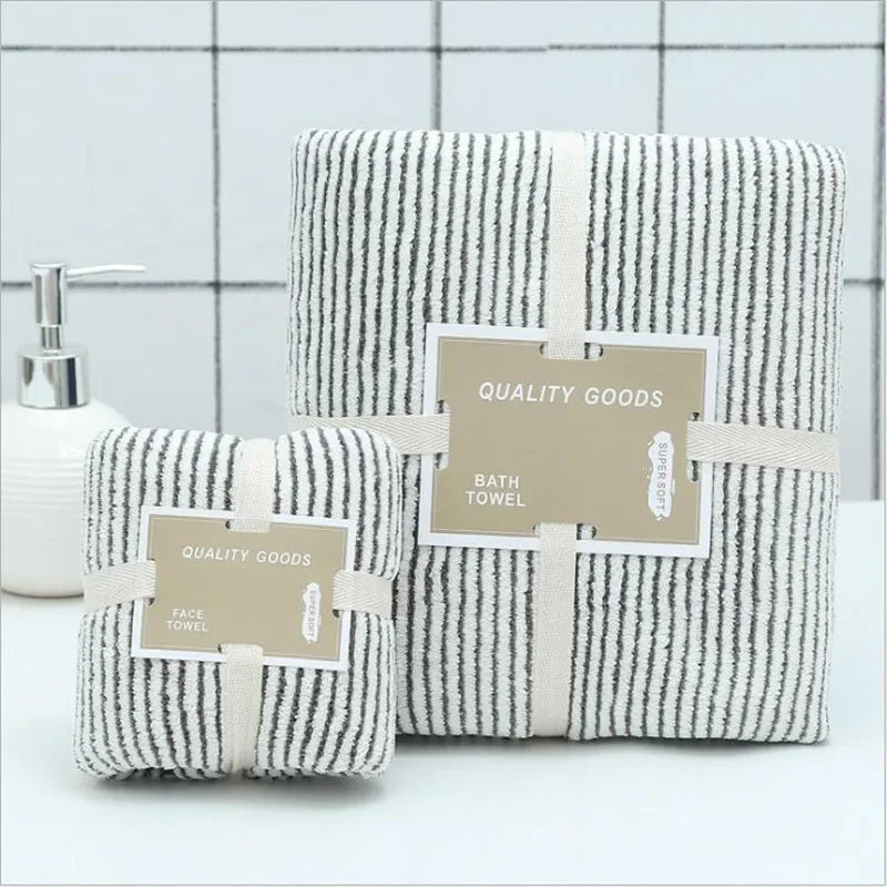 eProlo bamboo charcoal coral velvet bath and face towel set in striped grey and white.